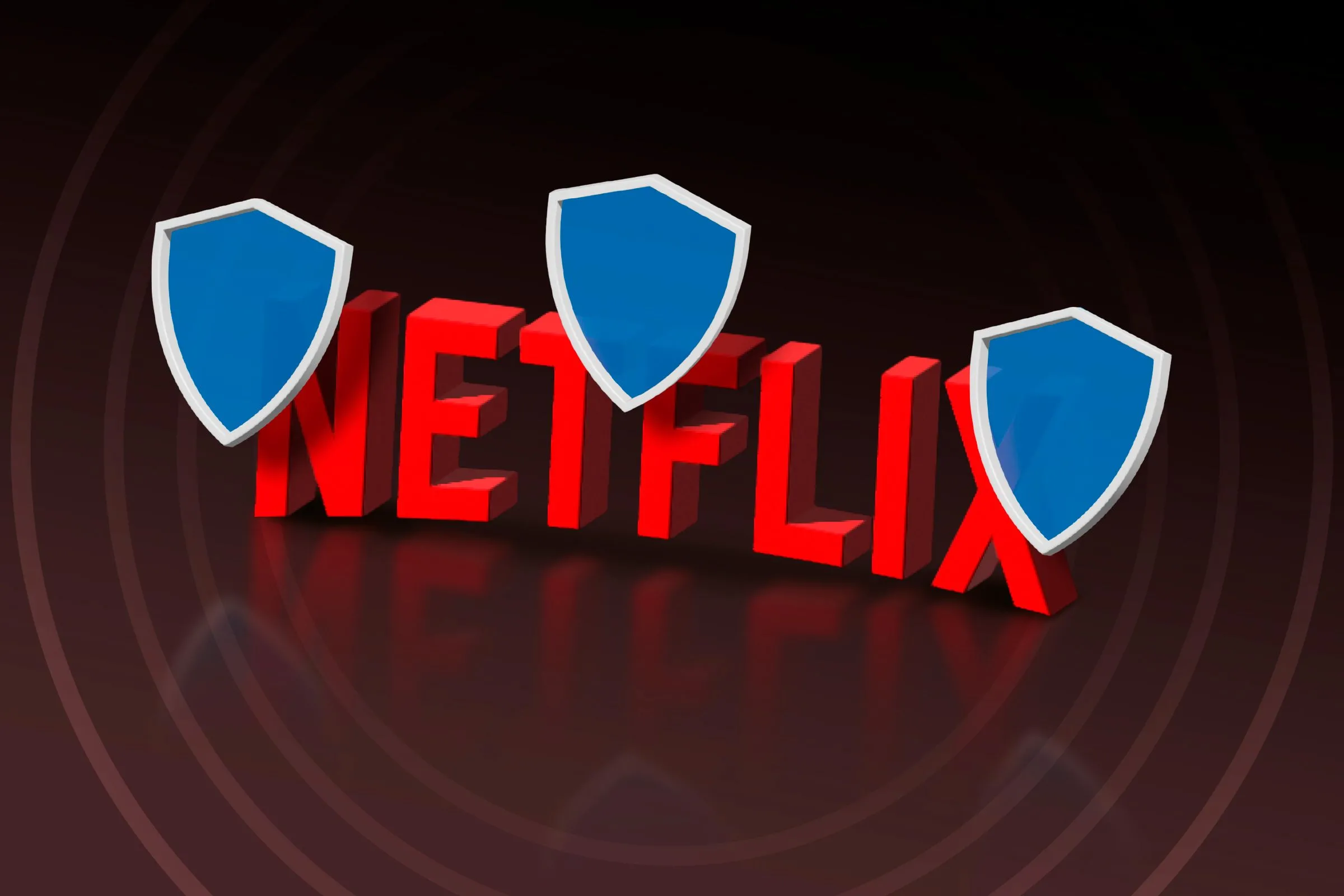 Biểu tượng Netflix 3D với các lá chắn bảo vệ, tượng trưng cho việc vượt qua chặn địa lý khi xem nội dung trực tuyến bằng VPN.