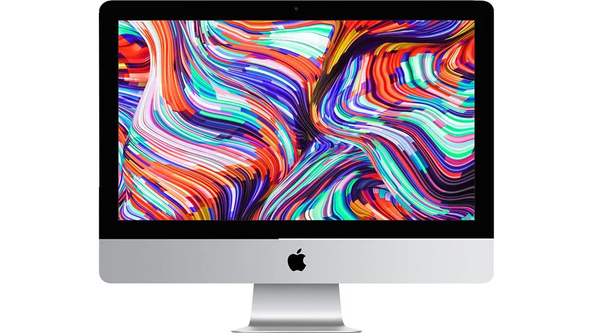 Hình ảnh iMac Unibody siêu mỏng 21.5 inch màu bạc trên bàn làm việc