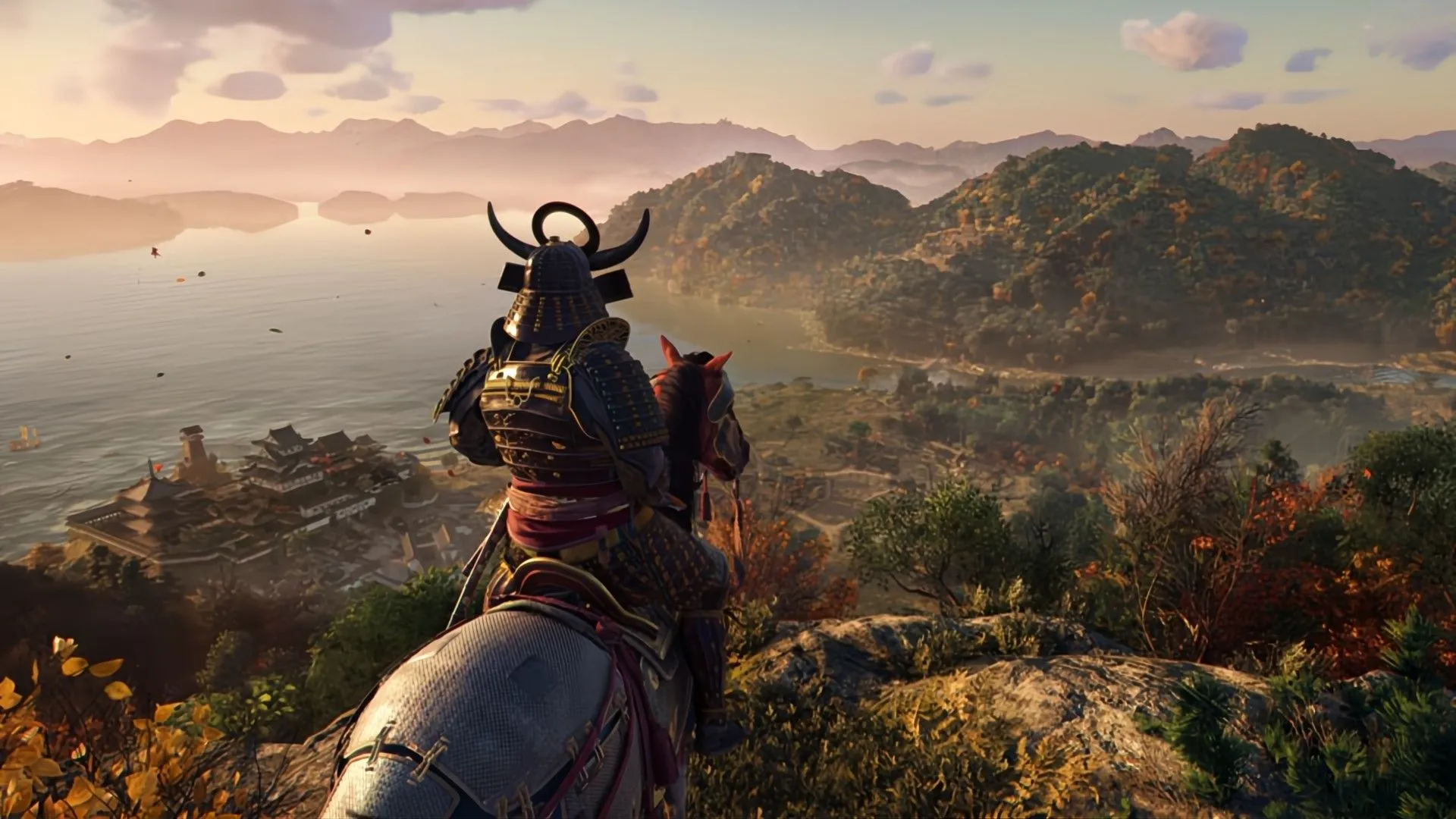 Nhân vật Samurai trong game Assassin's Creed Shadows đang nhìn xuống từ vách đá