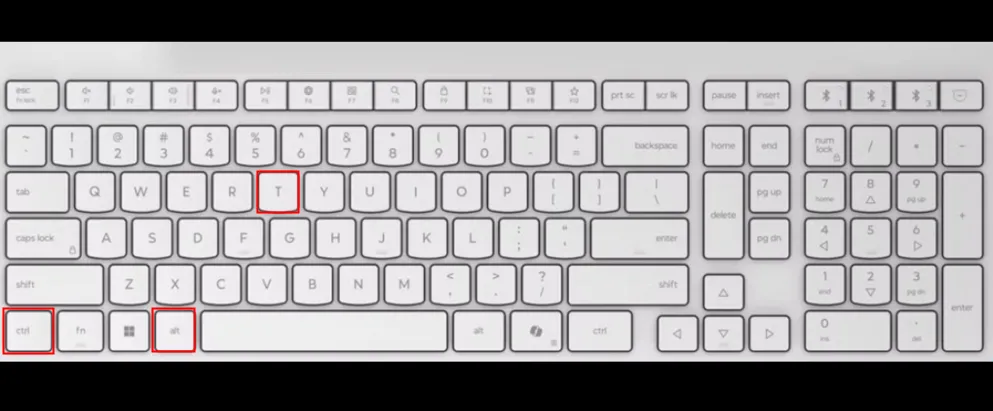 Bàn phím trắng làm nổi bật các phím Ctrl, Alt và T, hướng dẫn mở Terminal Ubuntu nhanh chóng
