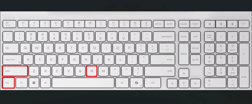 Bàn phím trắng làm nổi bật các phím Ctrl, Shift và N, minh họa cách tạo thư mục mới nhanh chóng trong giao diện người dùng Ubuntu