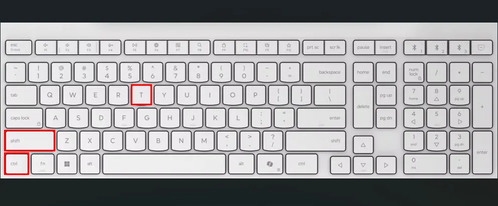 Bàn phím trắng với ô đỏ làm nổi bật phím Ctrl, Shift và T, hướng dẫn mở một tab Terminal mới trong Ubuntu