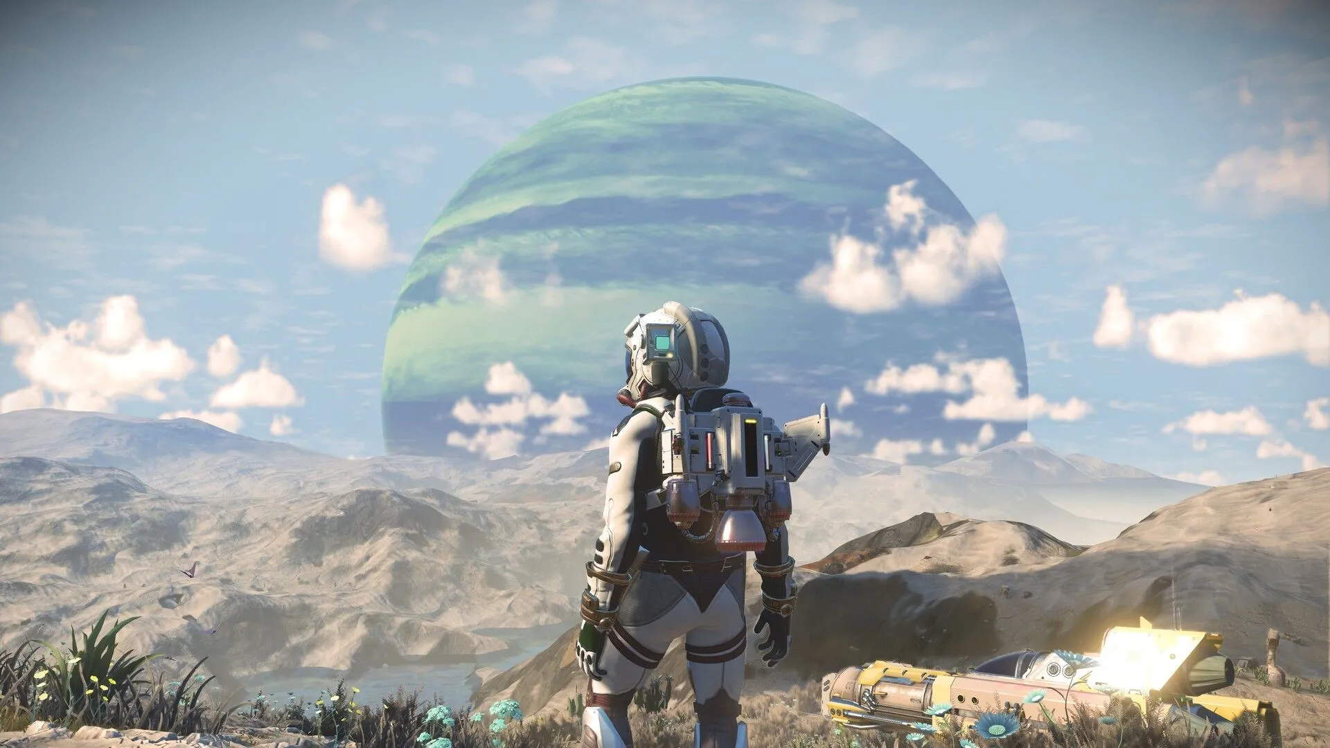 Góc nhìn thứ ba của một nhân vật trong bộ đồ không gian đang nhìn ra một hành tinh lạ trong game No Man's Sky.