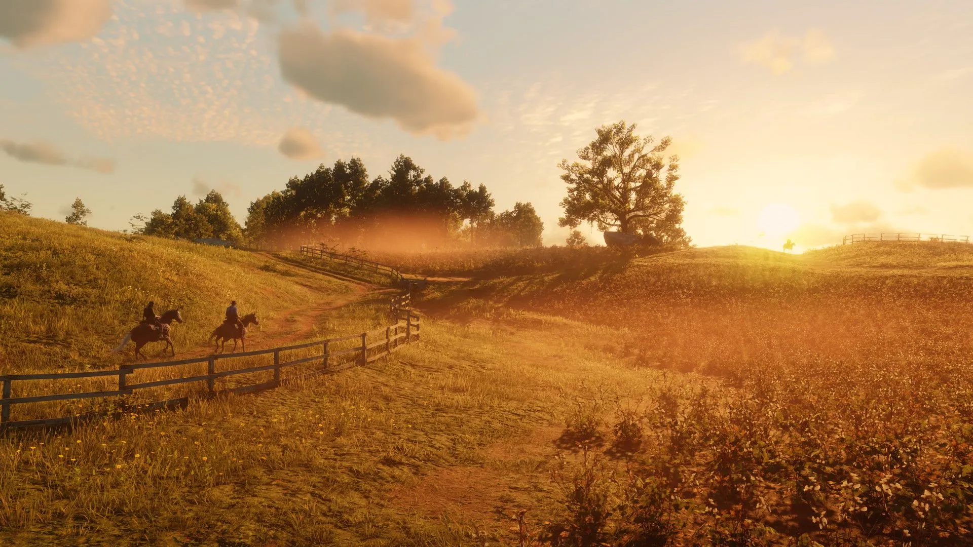 Hai cao bồi cưỡi ngựa băng qua cánh đồng trong tựa game Red Dead Redemption 2