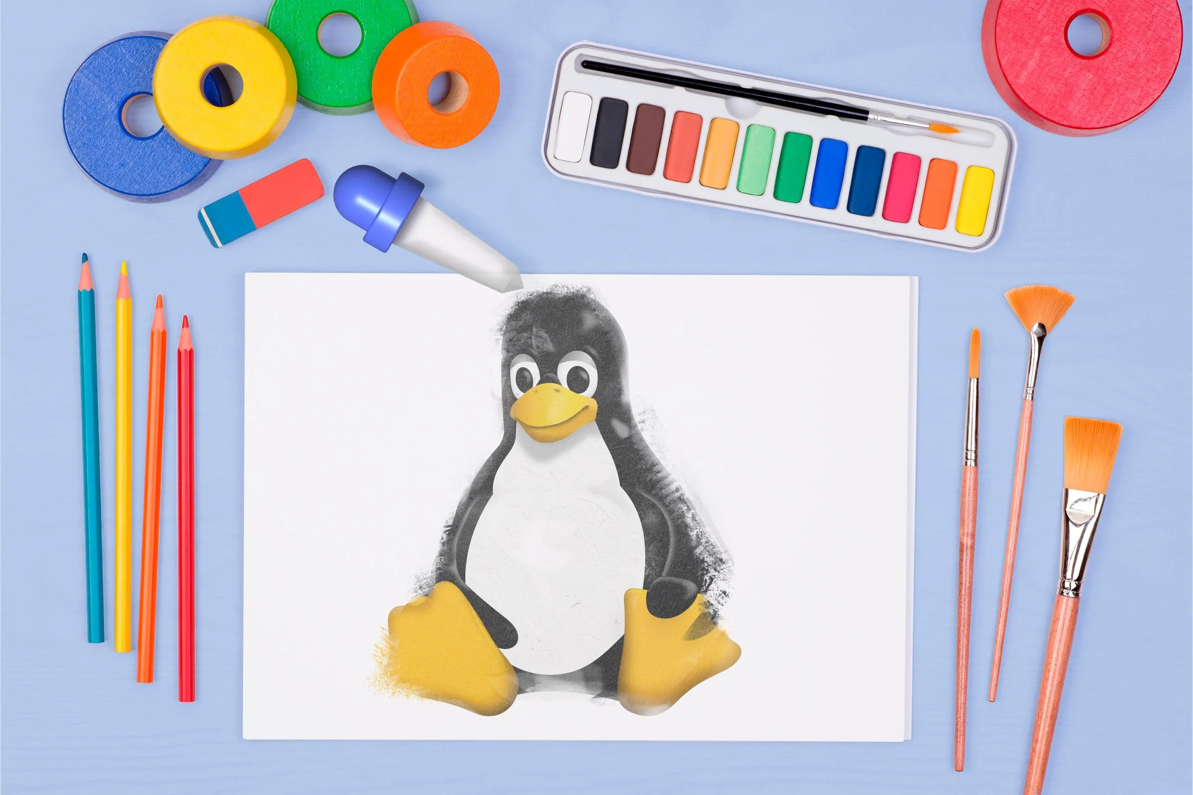 Hình ảnh các công cụ vẽ và biểu tượng Linux, liên tưởng đến các ứng dụng đồ họa và chỉnh sửa ảnh đơn giản.