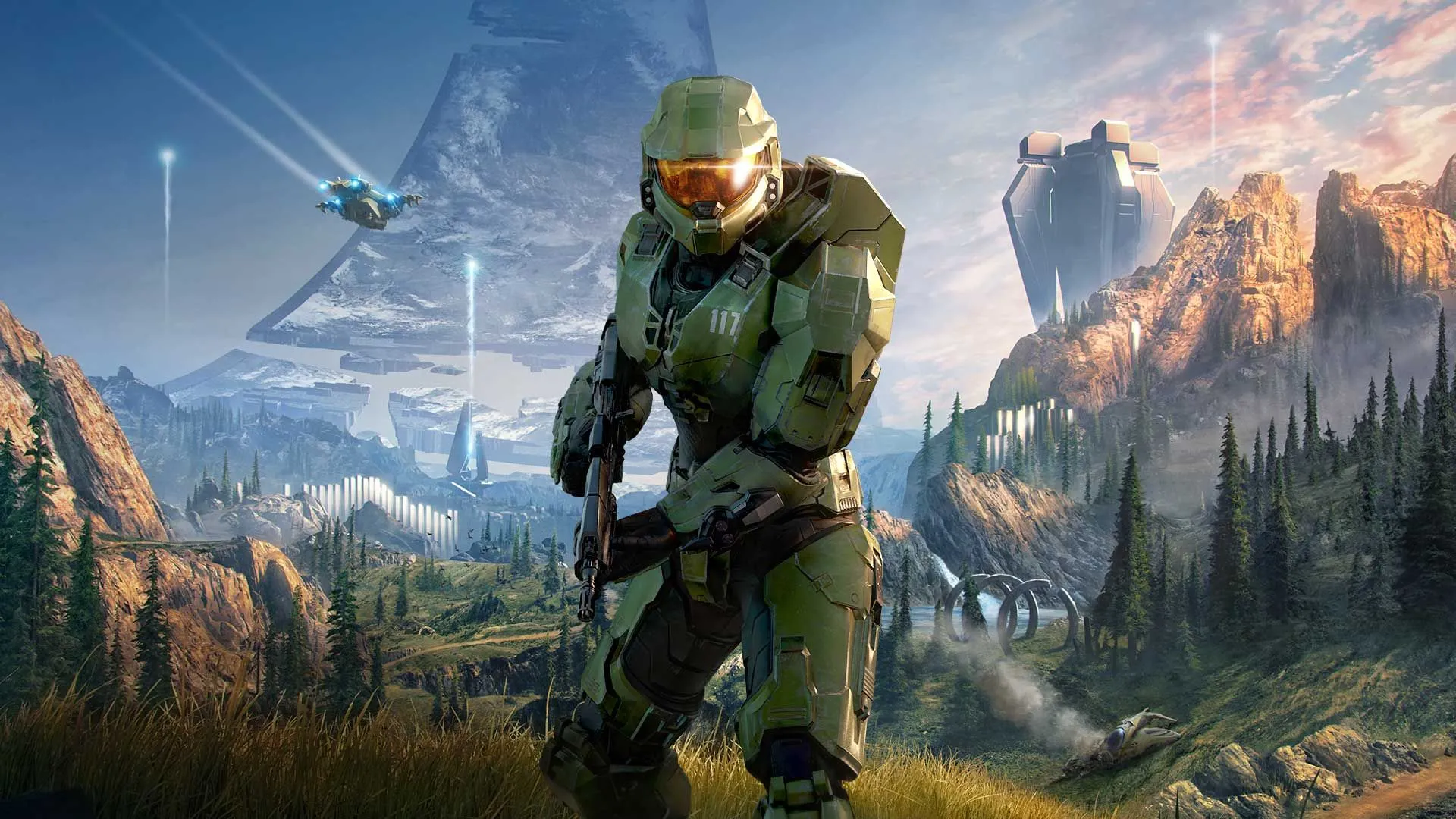 Master Chief cầm vũ khí trong khu vực rừng cỏ trên vành đai Halo Infinite, biểu tượng của series game bắn súng FPS huyền thoại Xbox