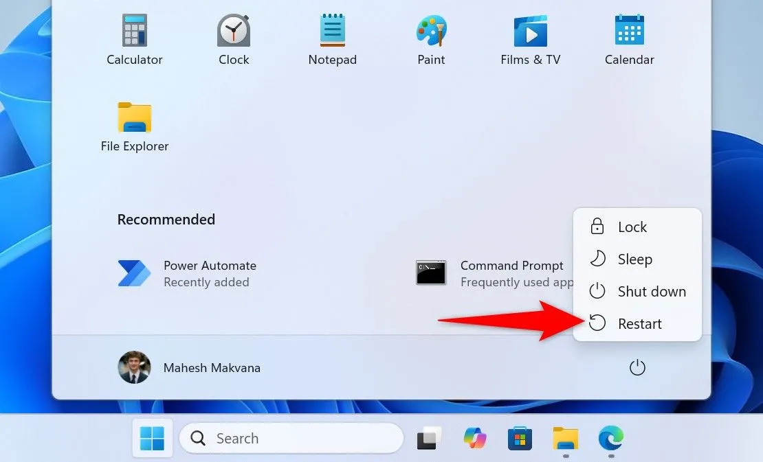 Menu Start của Windows 11 với tùy chọn &quot;Restart&quot; để khởi động lại máy tính