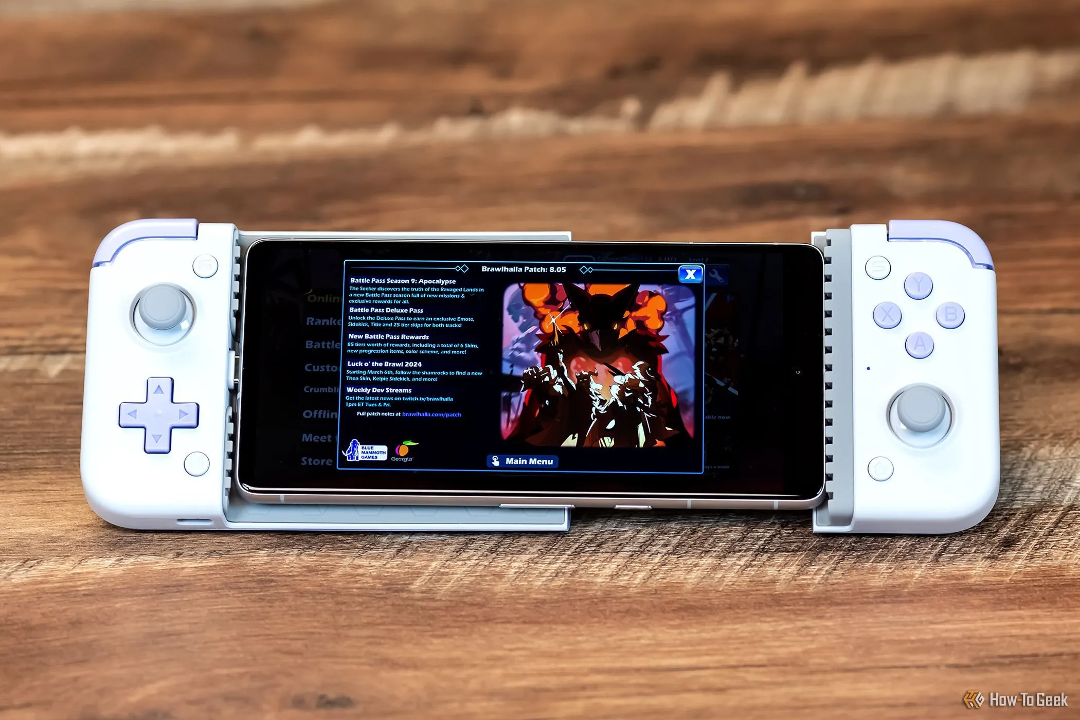 Tay cầm chơi game GameSir X2s Type-C kết nối với smartphone để trải nghiệm game đối kháng Brawhlhalla, minh họa sự tiện lợi của chơi game di động