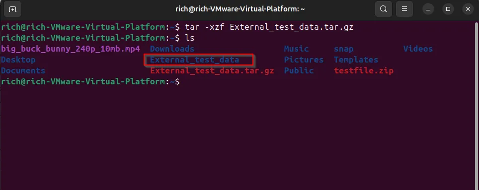 Terminal hiển thị một thư mục được tạo sau khi giải nén một file .tar.gz