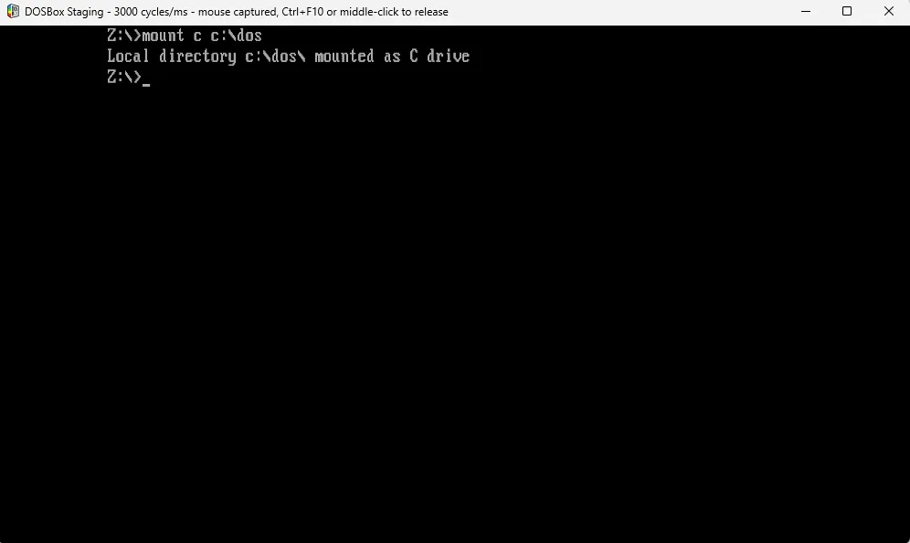 Gắn ổ C: ảo của DOSBox vào thư mục DOS trên máy tính thực.
