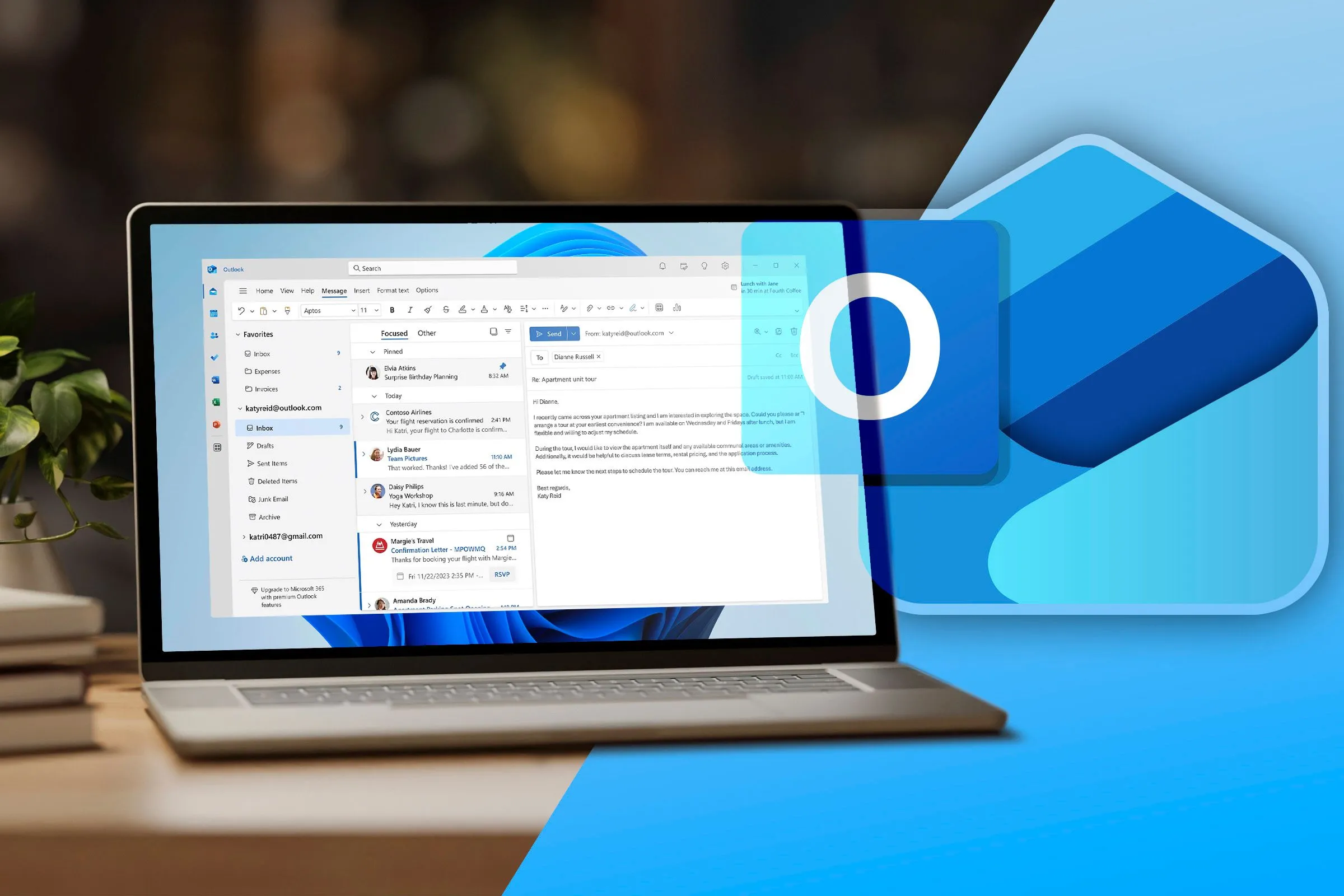 Laptop hiển thị giao diện Outlook với logo New Outlook