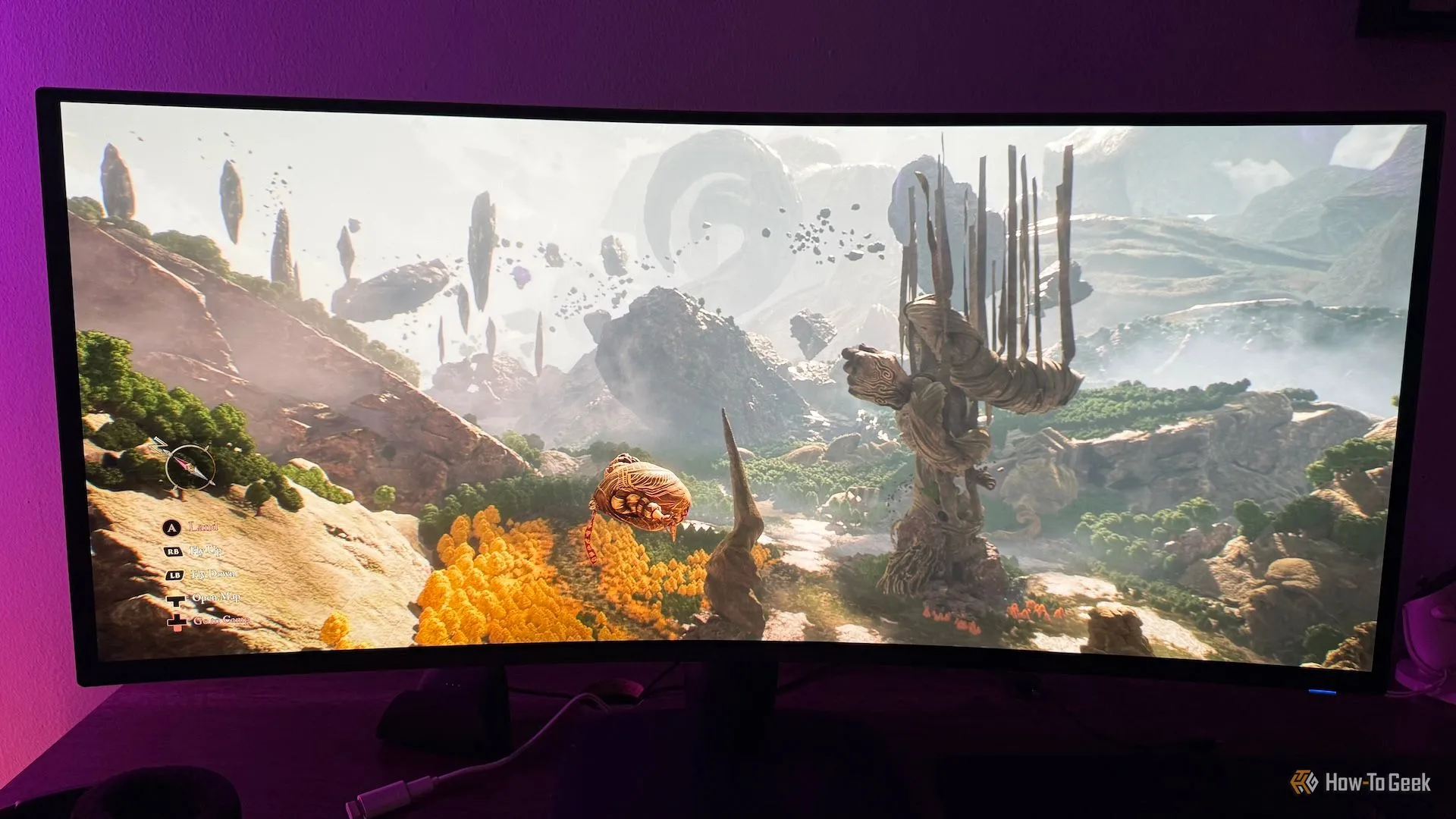 Màn hình Alienware AW3425DW hiển thị cảnh bay lượn trong thế giới game Clair Obscur: Expedition 33, nhấn mạnh trải nghiệm gaming ấn tượng.