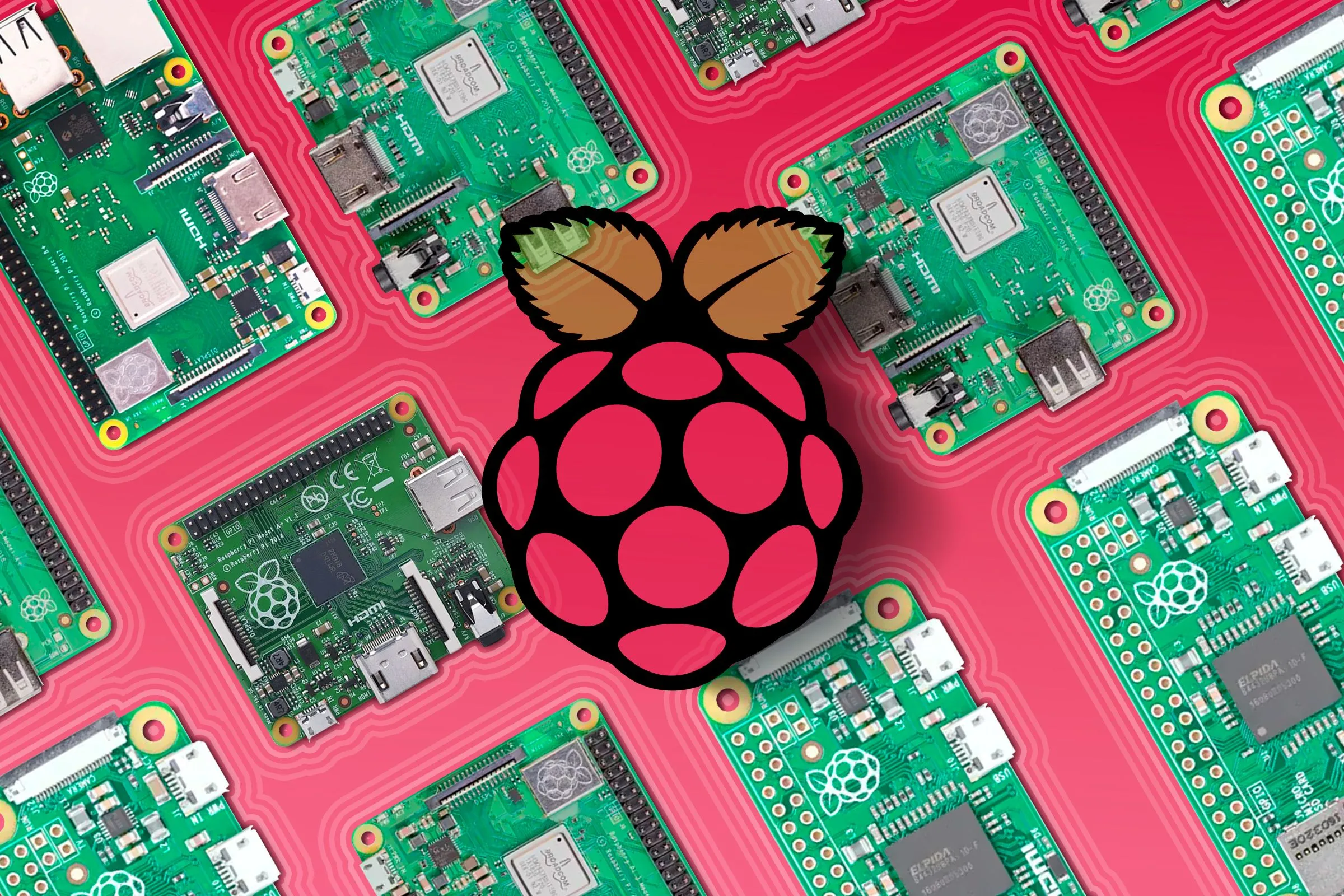 Nhiều thiết bị Raspberry Pi được đặt cạnh nhau, với logo ở trung tâm.